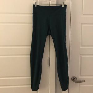 Green Lululemon leggings with lace up details